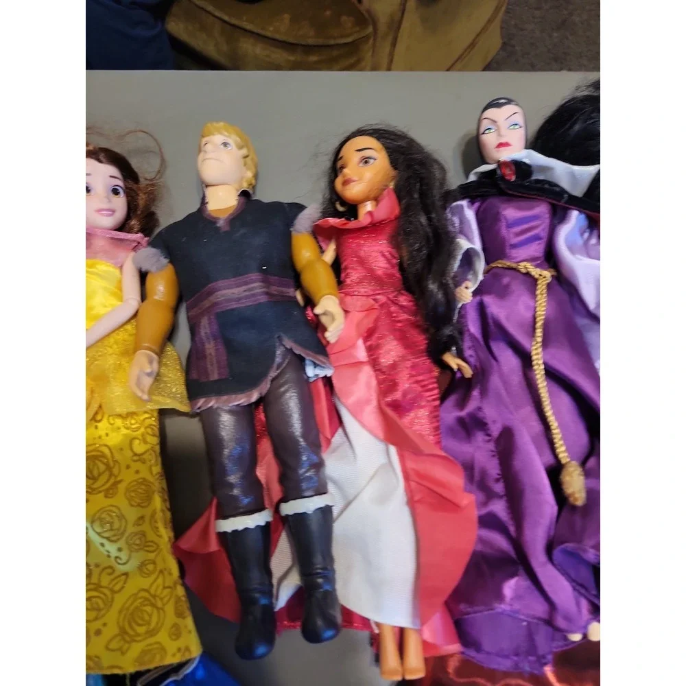 Disney Barbie dolls with extra dresses shoes etc... Mixed lot